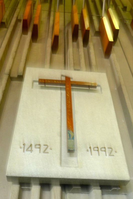 There is the symbol of the Cross, marked with the date that Columbus brought Christianity to this part of the world.